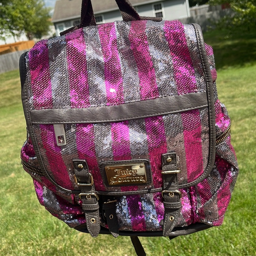 Preowned Authentic juicy, couture, pink and silver sequins  back pack.